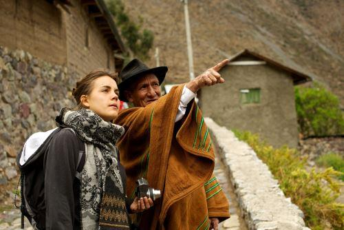 Local guide showing the way to a traveller